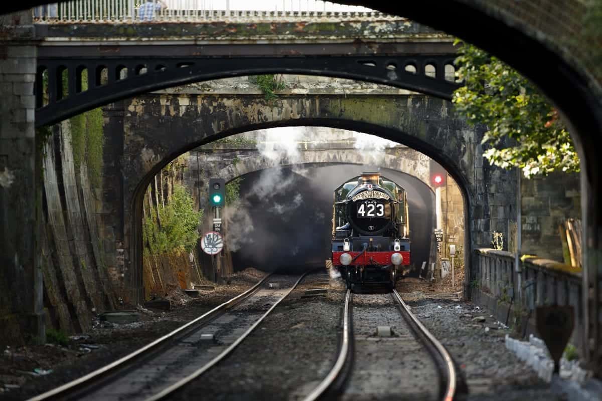 EGGB1W The Weymouth Seaside Express passes Sydney Gardens as it leaves Bath Spa. Image shot 08/2013. Exact date unknown.