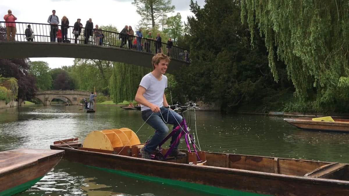 Barnaby Walker, 22 on his pedal powered punt. See Masons copy MNPUNT: An engineering student has invented a new way of powering a traditional river punt - by pedal power. Barnaby Walker, 22, took up the challenge from his supervisor after trying to find new ways of powering a punt and came up with the 'puntcycle'. The Cambridge University student converted an unloved old punt into a sleek, two-wheeled speed machine - capable of leaving all other river-users in his wake. He decided to breathe new life into French Hen, a punt which was a year older than himself, and rescued it after being beached for three years.