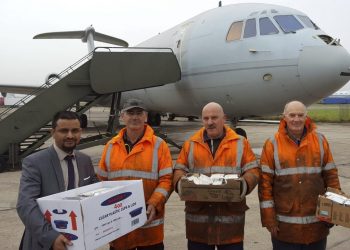 Shajahan Chowdhury delivering curry as payment for the plane to workers of GJD Aerotec.  An indian restaurant boss with dreams of being a pilot has finally got his very own plane - after swapping it for 500 curries and 1,000 poppadoms.  See ROSS PARRY story RPYCURRY.  Shajahan Chowdhury bartered with the spicy fare to get his hands on the shell of 49-foot-long Hawker Siddeley HS125 jet which he now plans to turn into a restaurant.  Aviation salvage company GJD Services were only too happy to swap the ex-charter jet for 150 vindaloos, 150 Bombay Aloos, 100 onion bhajis and a cockpit full of poppadoms.  A promise of a further 200 tasty treats will follow on request.  Mr Chowdhury , who is originally from Bangladesh, yearned to be a pilot when he was a young boy, is hoping to revamp to he plane so it looks like a private jet.  As as chef he has worked all round the country, and during his career he has cooked for stars such as Cliff Richard, the Spice Girls. Aswad, Soul 2 Soul and Chaka Khan.