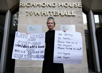 Senior mental health nurse Jade Taylor outside the Department for Health in London where she is on hunger strike, October 11 2016. See SWNS story SWWHISTLE: An NHS manager who says she faces the sack today (Wed) for whistleblowing has gone on hunger strike outside the Department of Health. Jade Taylor, a senior mental health nurse says she will be sacked today (Weds) for raising concerns about patient and staff safety is on hunger strike outside the Department of Health. Senior mental health nurse Jade Taylor, 46, claims her parents were mistreated during the scandal at Mid Staffordshire NHS Foundation Trust.