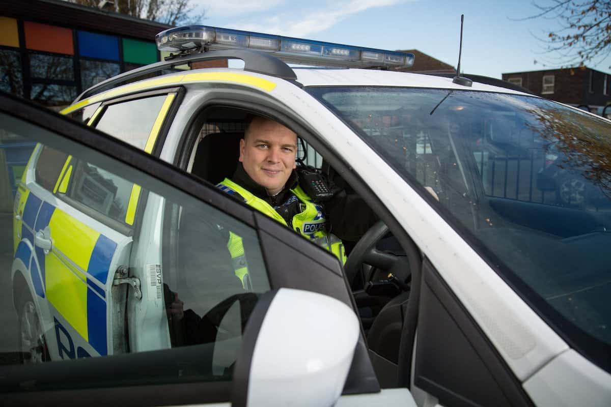 Richard Godfrey, Inspector Special Constabulary, who is also a manager of Waitrose in Bath, pictured at Hucclecote Police Station near Gloucester, which is Britain's first police station run entirely by volunteers. November 18 2016.  See SWNS story SWFREE: A police station is believed to be the first in the country with NO front-line officers - and is run by a part-time volunteer who is a WAITROSE manager. Hucclecote police station in Gloucestershire once had several full-time police officers and a sergeant patrolling the streets. But thanks to budget cut-backs it is now staffed by a team of 10 'specials' - who are not fully trained or paid - although less than half are on duty at the same time. They are headed by Special Inspector Richard Godfrey, 29, who works on a voluntary basis around his full-time job as a branch manager at Waitrose.