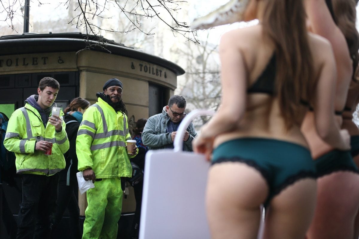 A trio of nearly naked models – dressed in little more than lingerie and crocodile masks – crash the first day of London Fashion Week, brandishing signs proclaiming, "Cruelty to Crocodiles Unmasked" and "Animals Die for Exotic Skins", February 17 2017. See National News story. The action follows a recent PETA exposé of crocodile farms in Vietnam – including two that have supplied skins to a tannery owned by Louis Vuitton's parent company, LVMH – which revealed that the animals are confined to tiny pits and sometimes hacked apart while they're still alive and thrashing.