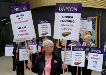 Members of Unison and other NHS campaigners protest outside The Queen Elizabeth Hospital ahead of a meeting of NHS Greater Glasgow and Clyde annual board meeting. August 4, 2016. The protesters are blaming the authority for a number of cuts to services.
