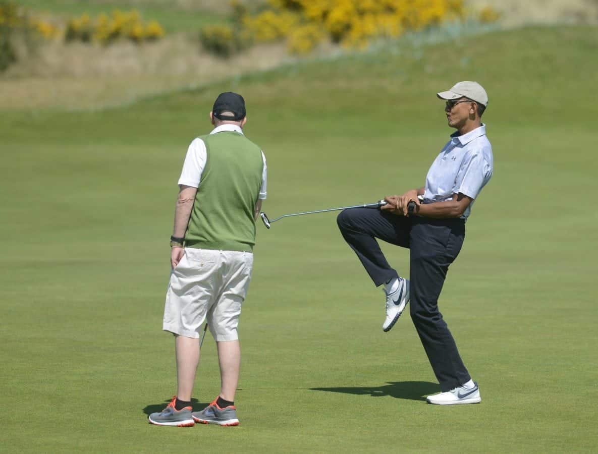 Former US President Barack Obama celebrates after a succesful put as he plays the Old Course at St Andrews, Fife, Scotland, on his visit to Scotland. May 26, 2017.