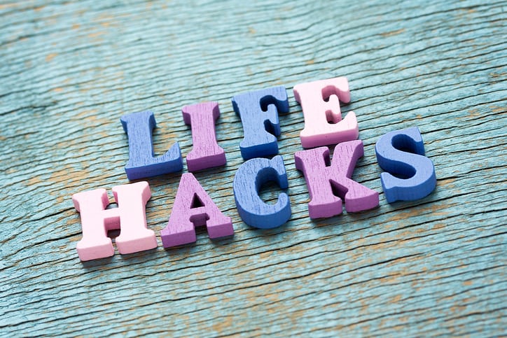 Life hacks phrase made of wooden colorful letters on vintage background