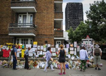 The charred remains of Grenfell Tower remains dominant in the landscape, a bleak memorial to 72 residents who burnt to death when the apartment caught fire on July 11 2017.