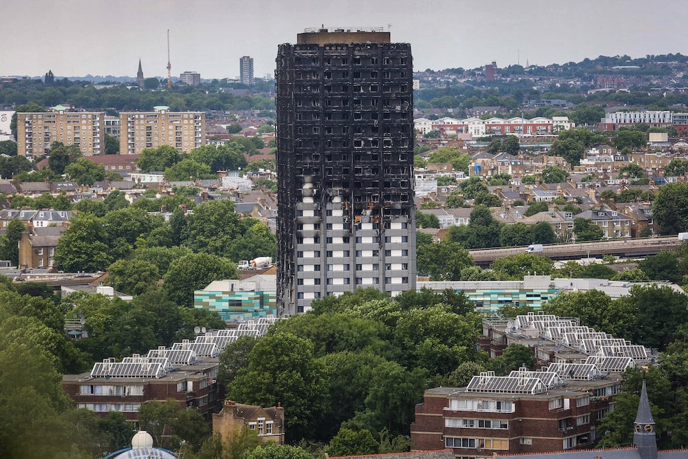 The charred remains of Grenfell Tower remains dominant in the landscape, a bleak memorial to some 80 residents who burnt to death when the apartment caught fire nearly a month ago, July 11 2017.
