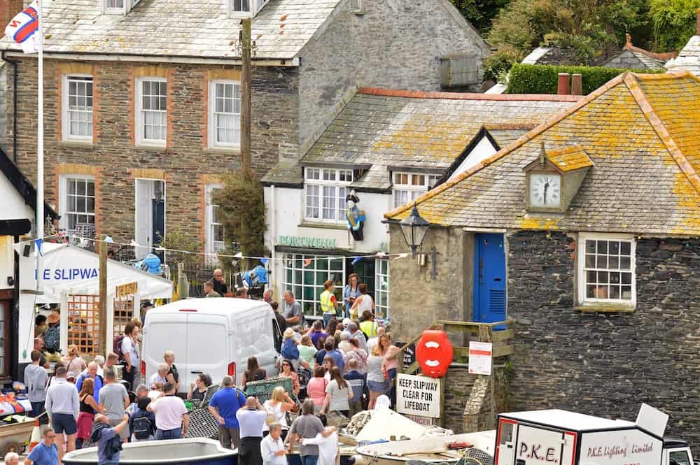 These pictures show Doc Martin filming with Hollywood A lister Sigourney Weaver, See SWNS story SWALIEN; These photos show the Alien star dressed up with a hat and camera around her neck,playing the part of Beth Traywick, the famous show which is filmed in Port Isaac, Cornwall.