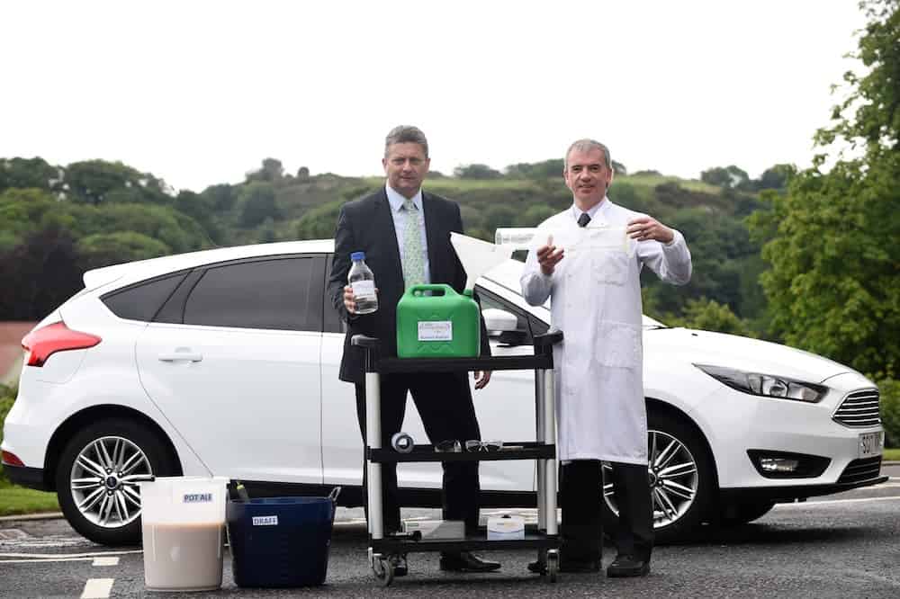 FREE FIRST USEMark Simmers from Celtic Renewables(L) and Professor Martin Tangney with the world's first car to be fuelled by whisky residue biofuel takes it's inaugural journey. See Centre Press story CPFUEL; The world's first car running on a biofuel made from WHISKY residue has had its first successful test drive. The fuel - biobutanol - is a brand new type of sustainable fuel and is designed to be a direct replacement for petrol and diesel. It is produced from draff - the sugar-rich kernels of barley which are soaked in water to facilitate the fermentation process necessary for whisky production. The other main ingredient is pot ale, the copper-containing yeasty liquid that is left over following distillation. Unlike other biofuels, biobutanol can be used as a direct replacement for road fuels like petrol or diesel.Lesley Martin
07836745264
lesley@lesleymartin.co.uk
www.lesleymartin.co.ukAll images © Lesley Martin 2017. Free first use only for editorial in connection with the commissioning client's press-released story. All other rights are reserved. Use in any other context is expressly prohibited without prior permission.