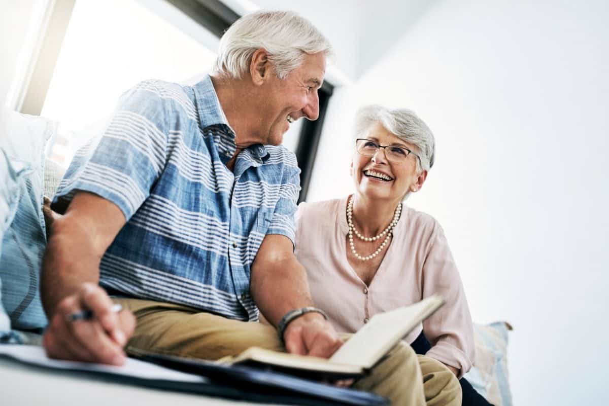 Shot of a senior couple going through their paperwork together at home