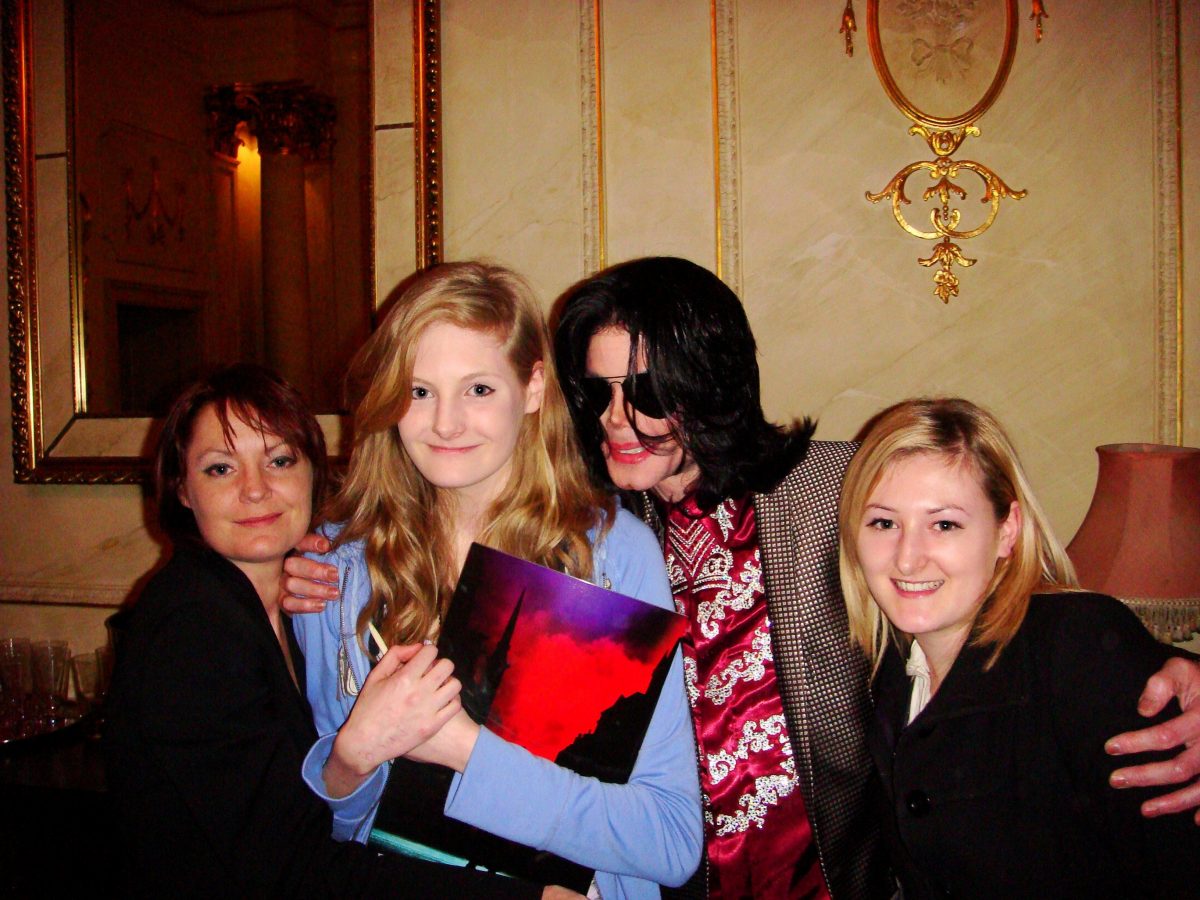 Lucy Lester, right, has defended godfather Michael Jackson, second right, against allegations of sex abuse in recent documentary Leaving Neverland. Also pictured are Lucy's mother Lisa, far left, and sister Harriet, second left. They are pictured with the star in London in March 2009 months before his death