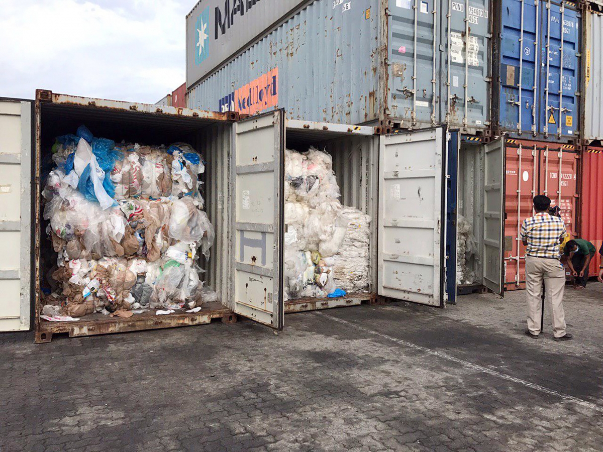 In this Tuesday, July 16, 2019, photo, containers loaded with plastic waste are placed at country beach city, Sihanoukville Port, southwest of Phnom Penh, Cambodia. A Cambodia's committee to investigate the sources of the trash discovered packing in more than 80 containers at country beach city, Sihanoukville Port, is needing seven to ten days to conclude their investigative, an official said Wednesday, July 17, 2019. (AP Photo/Sea Seakleng)