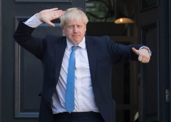 Boris Johnson poses outside Number 10 Downing Street (PA)