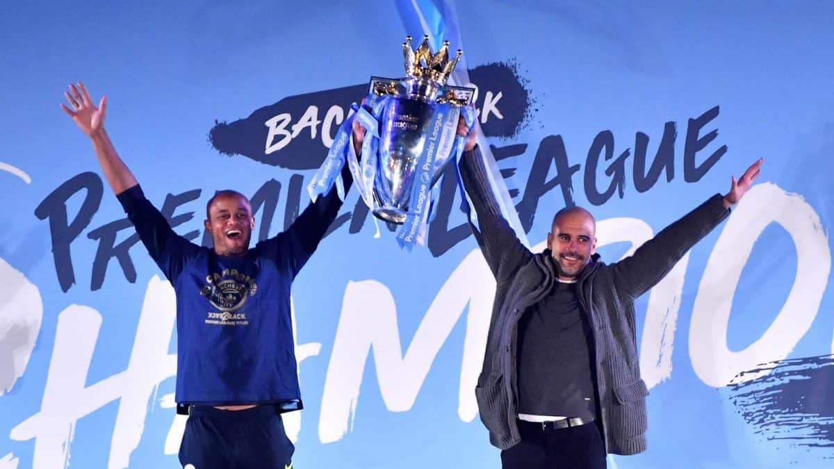 Vincent Company and Pep Guardiola celebrate Manchester City Premiership win