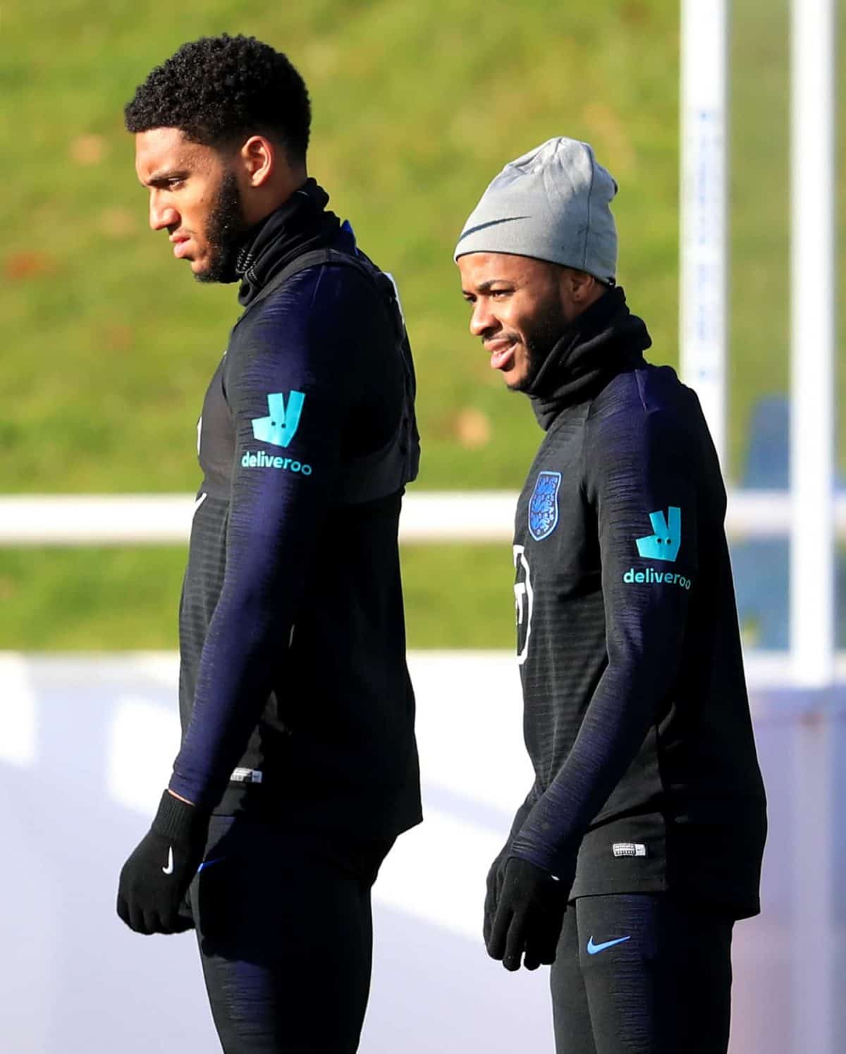 England's Joe Gomez (left) and Raheem Sterling during the training session at St George's Park, Burton. Credit;PA