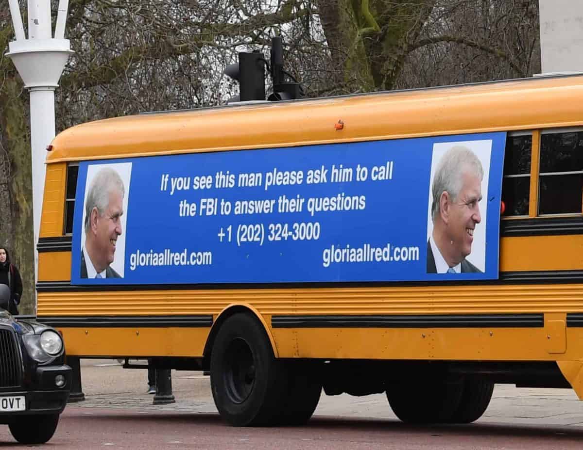 A yellow school bus with a post-birthday message for the Duke of York, from US lawyer Gloria Allred, driving along The Mall towards Buckingham Palace, London. Ms Allred, who represents five of the victims of Jeffrey Epstein, has been critical of the Duke for not speaking with the FBI about his former friend Epstein.