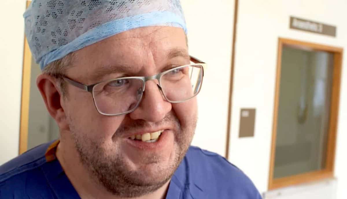 photo of Vascular surgeon Neil Hopper, 43, who had a below-the-knee double amputation after falling ill with sepsis.