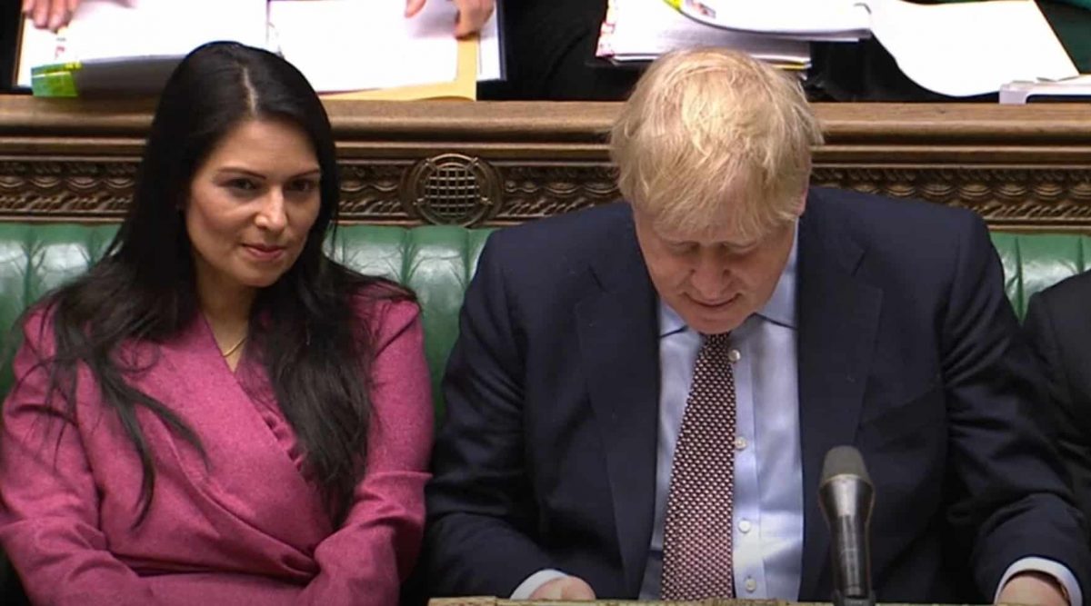Home Secretary Priti Patel and Prime Minister Boris Johnson during Prime Minister's Questions in the House of Commons, London.
