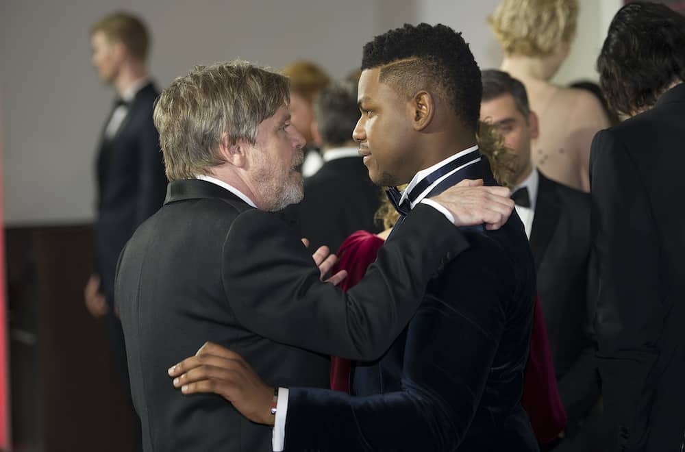 Mark Hamill and John Boyega attend the European premiere of Star Wars: The Last Jedi, at the Royal Albert Hall in London. PRESS ASSOCIATION Photo. Picture date: Tuesday December 12, 2017. See PA story SHOWBIZ StarWars. Photo credit should read: Eddie Mulholland/Daily Telegraph/PA Wire