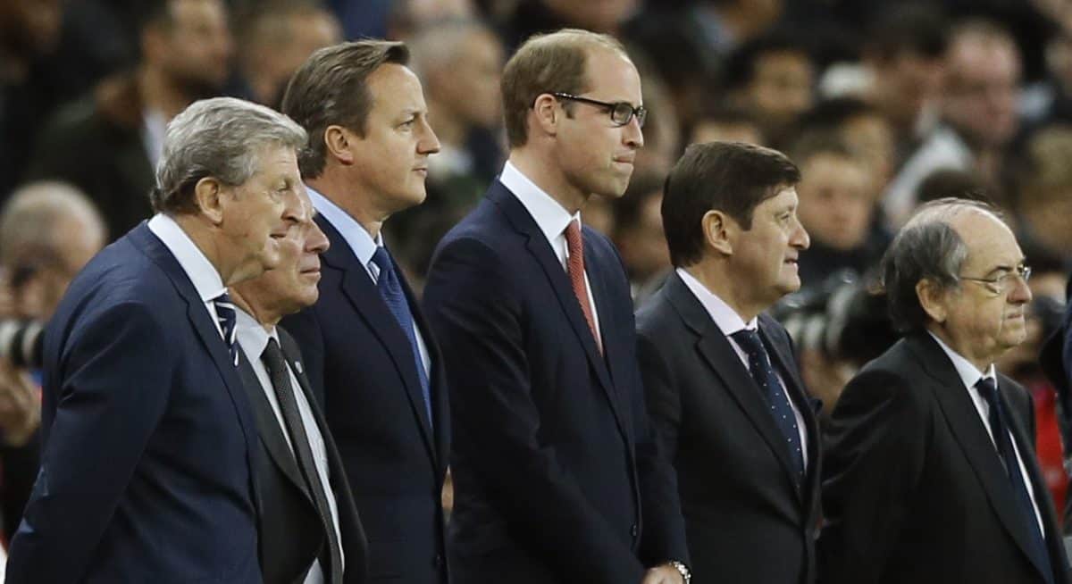 England coach Roy Hodgson, left, British Prime Minister David Cameron, second left, Britain's Prince William the Duke of Cambridge and France head coach Didier Deschamps, right, stand before the international friendly soccer match between England and France at Wembley Stadium in London, Tuesday, Nov. 17, 2015. France is playing England at Wembley on Tuesday after the countries decided the match should go ahead despite the deadly attacks in Paris last Friday night which killed scores of people. (AP Photo/Kirsty Wigglesworth)