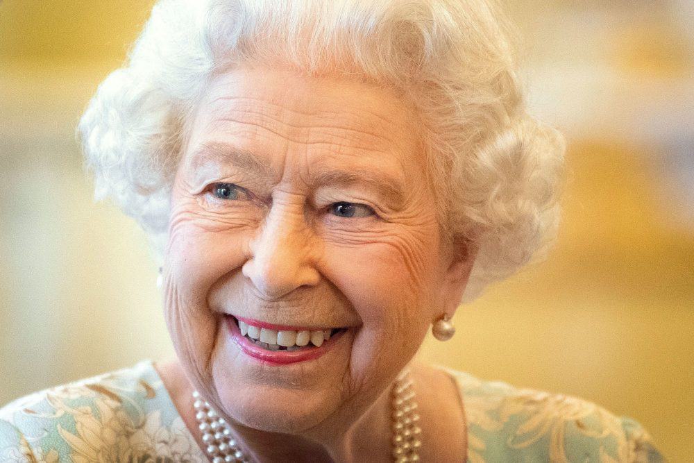 File photo dated 12/06/14 of Queen Elizabeth II hosting a reception at Buckingham Palace in London, to mark the work of The Queen's Trust. The Queen has led the royal family in paying tribute to the British Red Cross on the eve of its 150th anniversary, describing the charity's work as "valued and greatly appreciated".