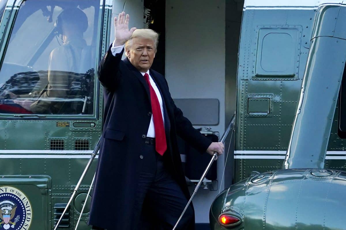 President Donald Trump waves as he boards Marine One on the South Lawn of the White House, Wednesday, Jan. 20, 2021, in Washington. Trump is en route to his Mar-a-Lago Florida Resort. (AP Photo/Alex Brandon)