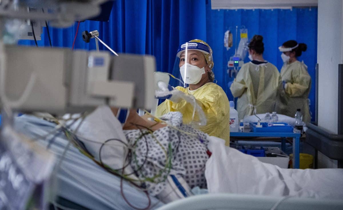 A nurse works on a patient in the ICU (Intensive Care Unit) in St George's Hospital in Tooting, south-west London, where the number of intensive care beds for the critically sick has had to be increased from 60 to 120, the vast majority of which are for coronavirus patients.