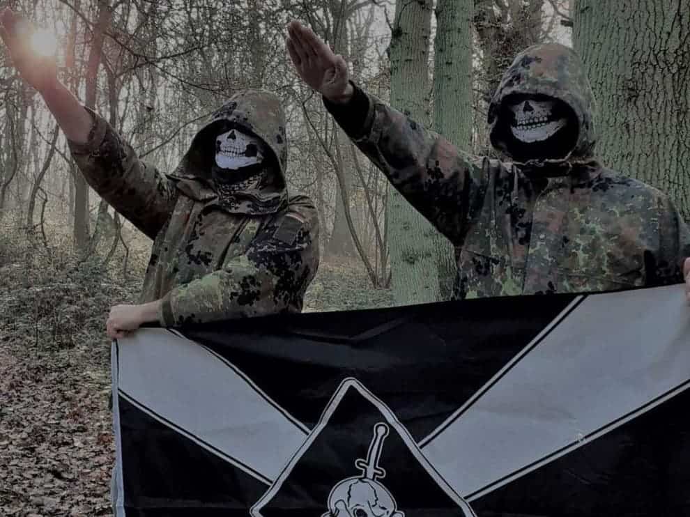 Two members of Feuerkrieg Division, not including the defendant, posing in a photo posted in an online chat(Eugene Antifa)