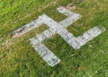A giant Nazi swastika was painted across a football pitch by mindless vandals Credit;SWNS
