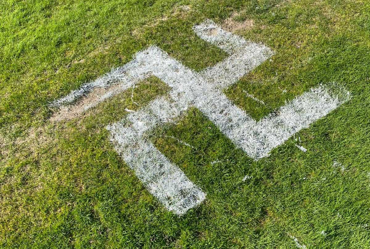 A giant Nazi swastika was painted across a football pitch by mindless vandals Credit;SWNS