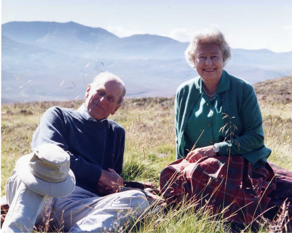 Handout image released by Buckingham Palace on 16/04/21 of a personal photograph of the Queen Elizabeth II and the Duke of Edinburgh at the top of the Coyles of Muick, taken by The Countess of Wessex in 2003. Issue date: Friday April 16, 2021.