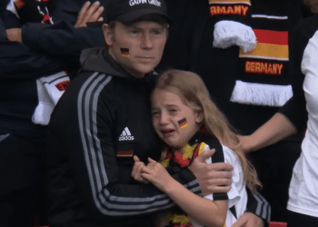German girl crying after her team lost in a football match against England. Photo: BBC.