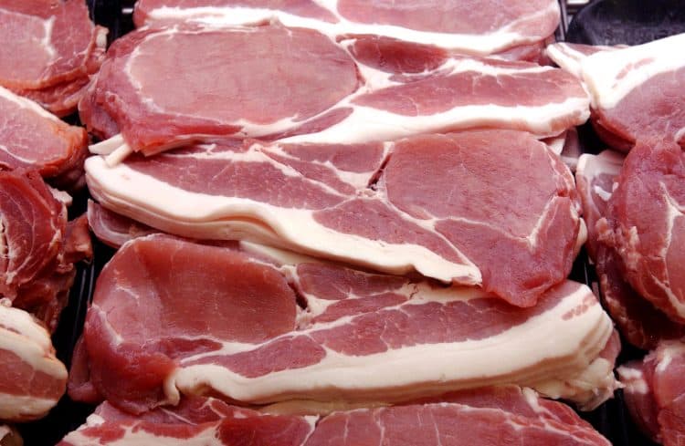 Embargoed to 0001 Wednesday April 17 File photo dated 5/1/2003 of rashers of bacon on display in a supermarket. Even moderate amounts of ham, bacon and and red meat are linked to bowel cancer, experts have warned.