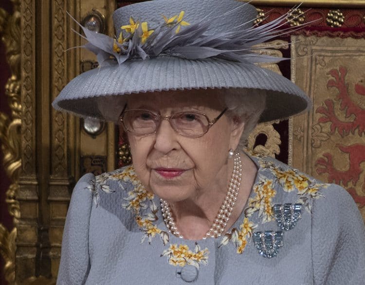 Queen Elizabeth II delivers a speech from the throne in House of Lords at the Palace of Westminster in London as she outlines the government's legislative programme for the coming session during the State Opening of Parliament. Picture date: Tuesday May 11, 2021.