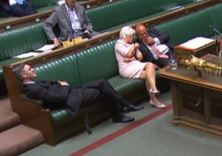 Leader of the House of Commons Jacob Rees-Mogg reclining on his seat in the House of Commons London.