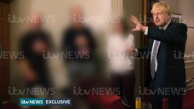 ITV handout photo dated 13/11/20 of a photograph obtained by ITV News of the Prime Minister raising a glass at a leaving party on 13th November 2020.