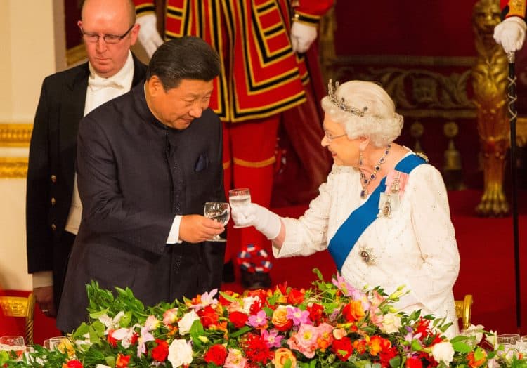 Chinese president Xi Jinping with the Queen at a state banquet at Buckingham Palace in 2015 (Dominic Lipinski/PA)